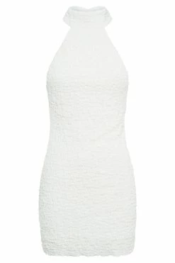 Yuki Textured Halter Mini Dress - White 15 Yuki Textured Halter Mini Dress - White -Meshki Shop B732022.12.07MESHKI 12998